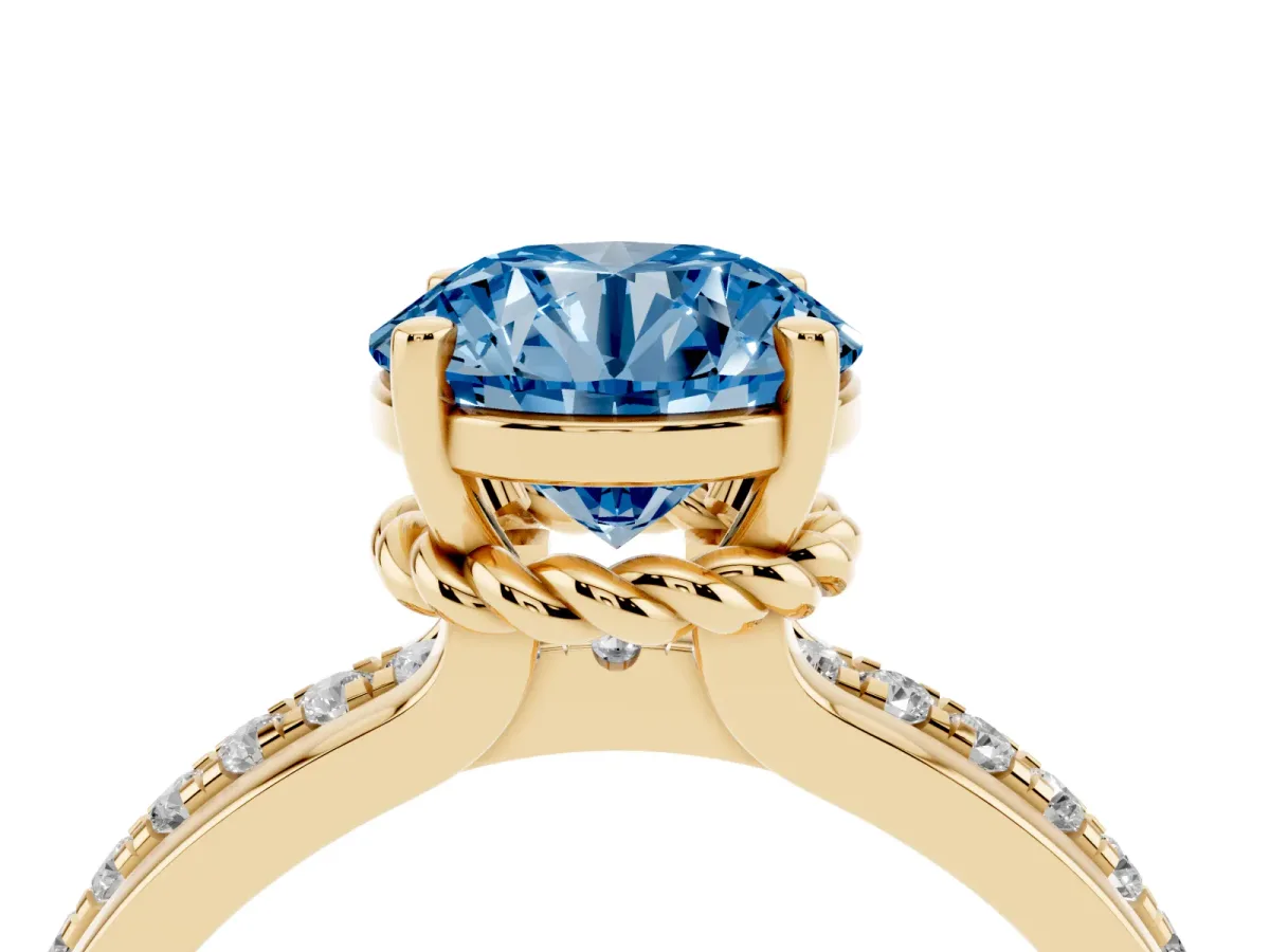 Fancy Blue Round Cut Solitaire Diamond Ring with Channel Set Band and Six-Prong Setting Yellow gold