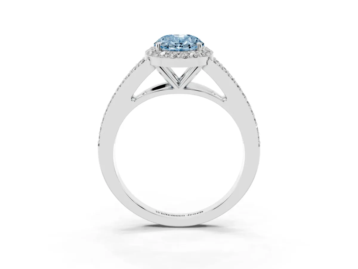 Fancy Blue Oval Cut Halo Split Shank Pave Diamond Ring with Four-Prong Setting Silver
