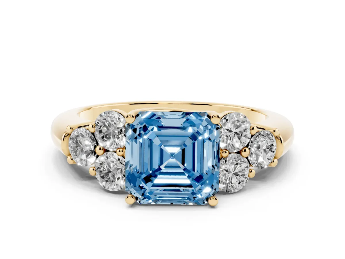 Fancy Blue Asscher Cut Cut Diamond Cluster Ring with Round Accent Stones and Prong Setting on a Classic Band Yellow gold