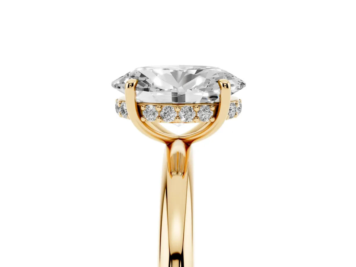Oval Cut Diamond Solitaire Ring with Thin Band and Four-Prong Setting Yellow gold