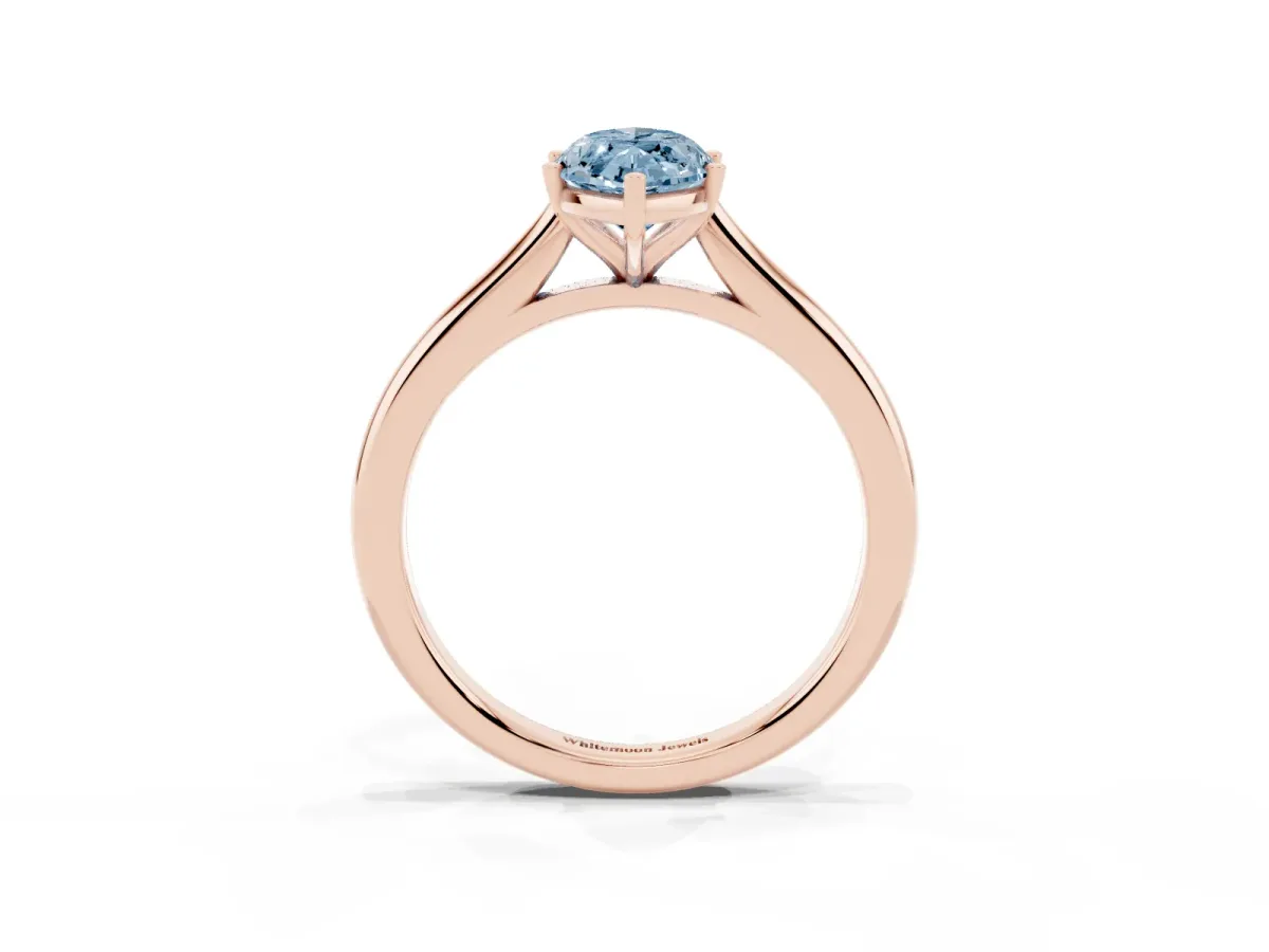Fancy Blue Marquise Cut Cut Solitaire Ring with Cathedral Band and Four-Prong Setting Rose gold