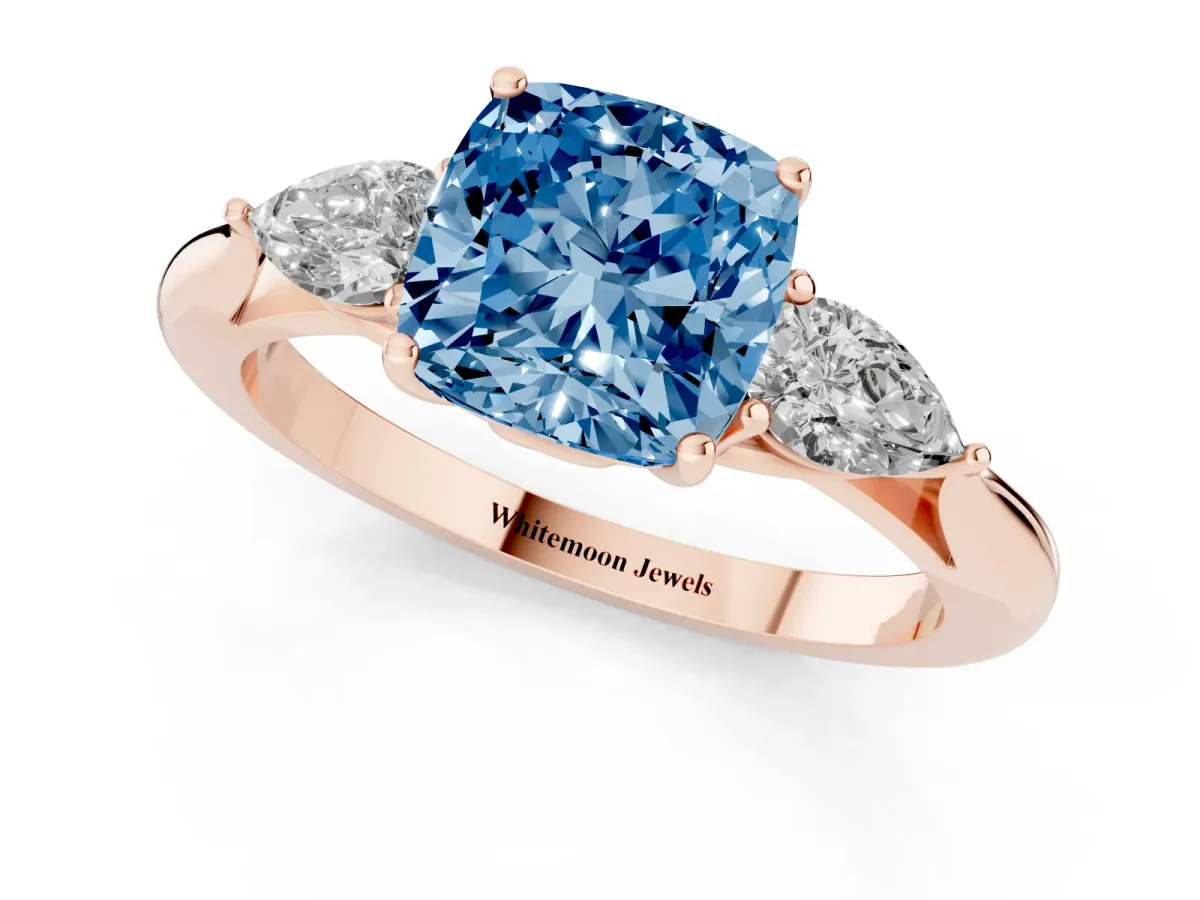 Fancy Blue Cushion Cut Diamond Three-Stone Ring with Pear Side Stones and Prong Setting Rose gold