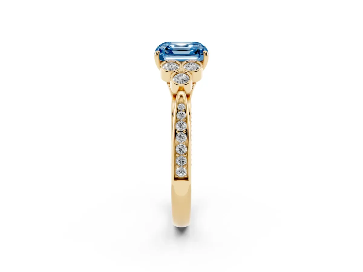 Fancy Blue Asscher Cut Cut Diamond Engagement Ring with Bezel Set Round Side Stones and Prong Setting Yellow gold