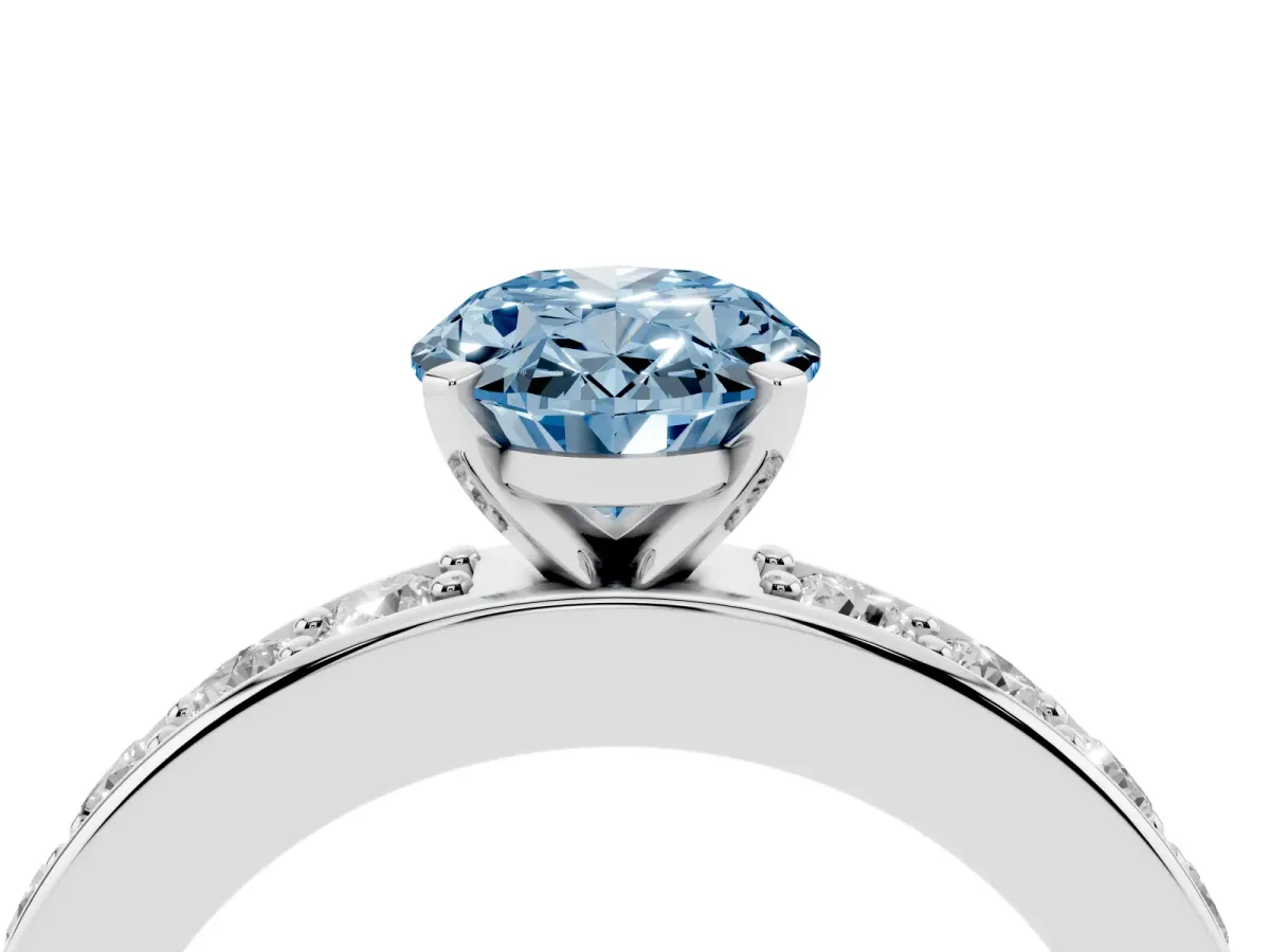 Fancy Blue Oval Cut Diamond Engagement Ring with Channel Set Round Band and Prong Setting Silver