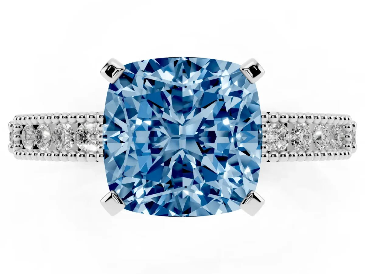 Fancy Blue Cushion Cut Solitaire with Pavé Band and Four-Prong Setting Silver