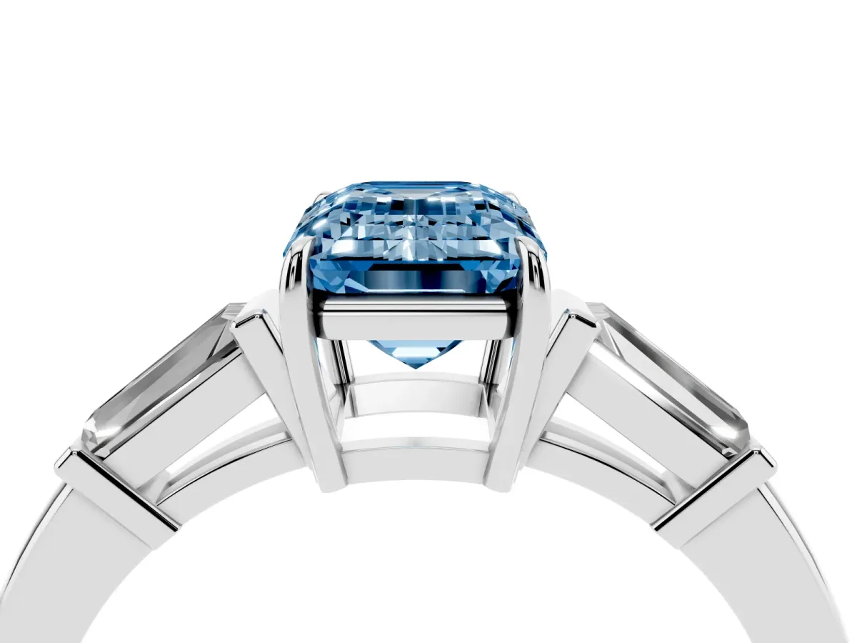 Fancy Blue Emerald Cut Diamond Three-Stone Ring with Tapered Baguette Side Stones and Prong Setting Platinum