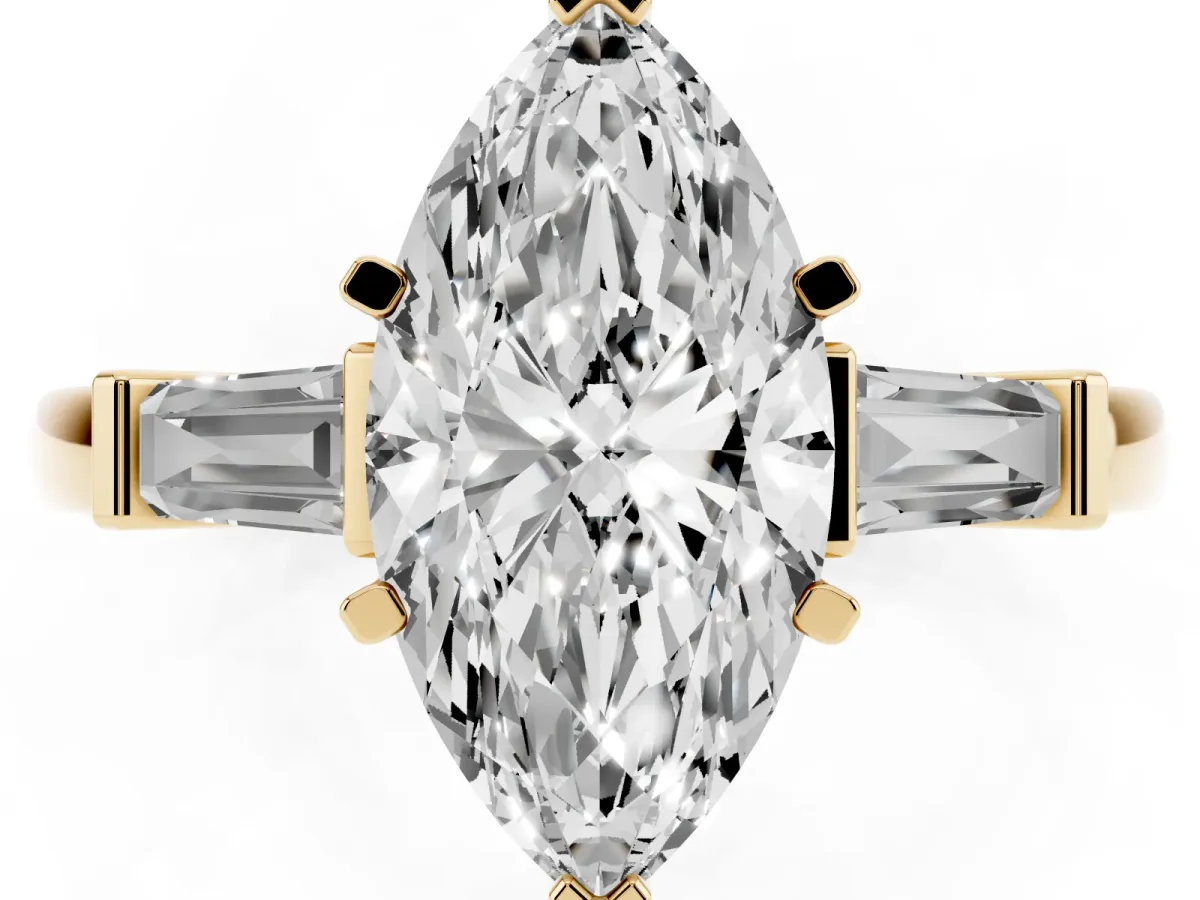 Marquise Cut Cut Diamond Solitaire Ring with Tapered Baguette Accents and Four-Prong Setting Yellow gold