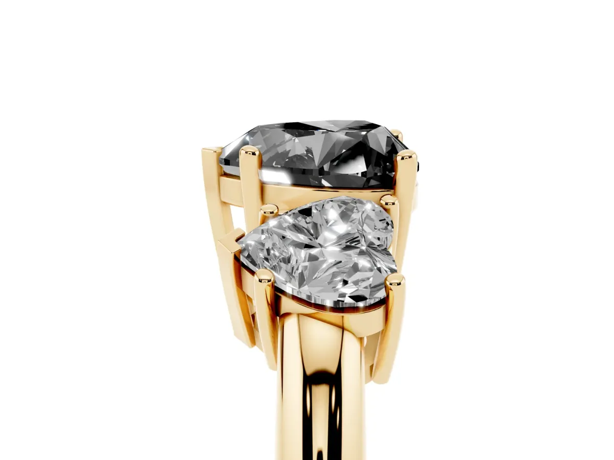 Fancy Black Three-Stone Heart Cut Cut Diamond Engagement Ring with Prong Setting on a White Gold Band Yellow gold