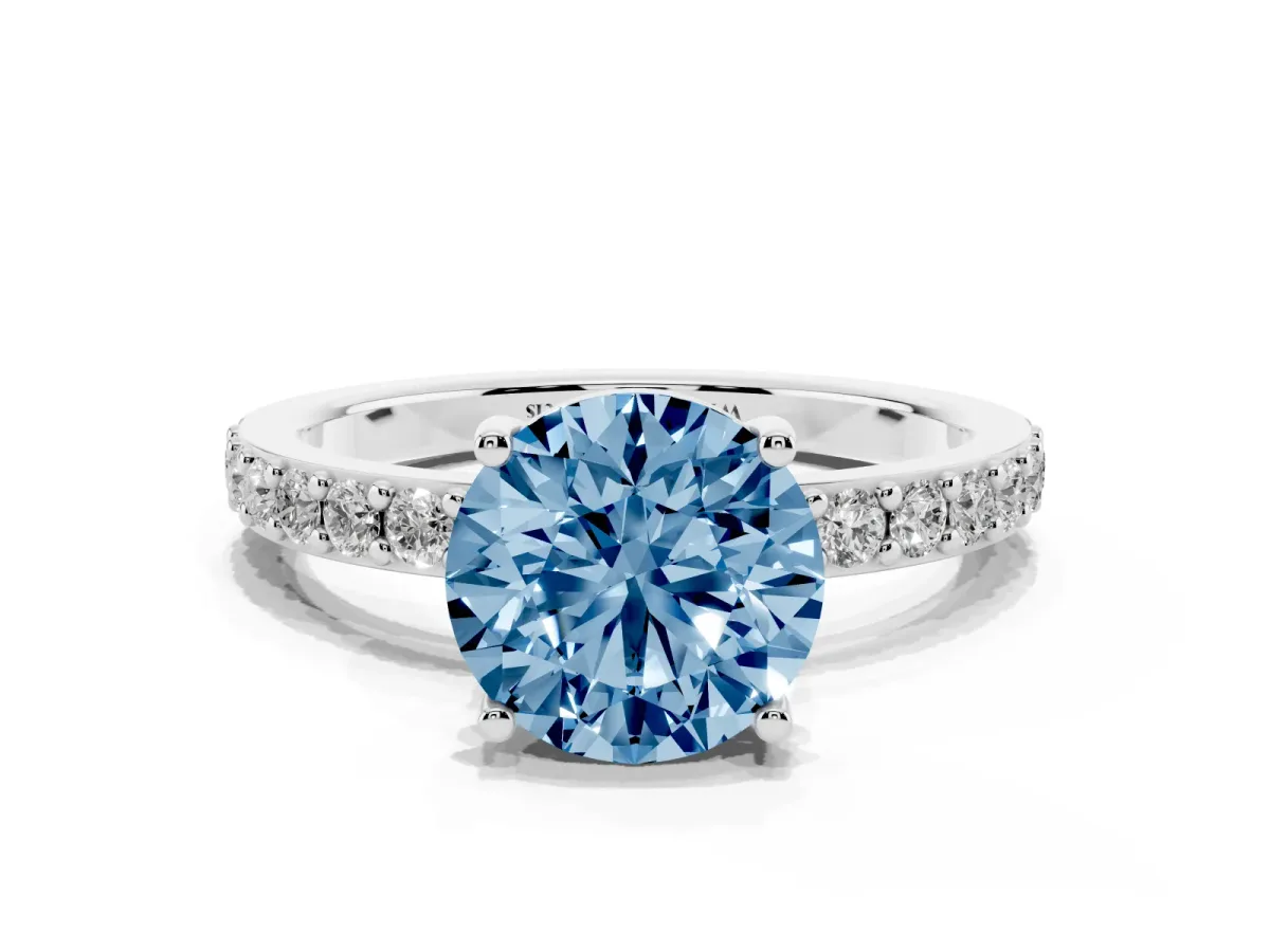 Fancy Blue Round Cut Cut Diamond Solitaire with Pave Band and Four-Prong Setting Silver