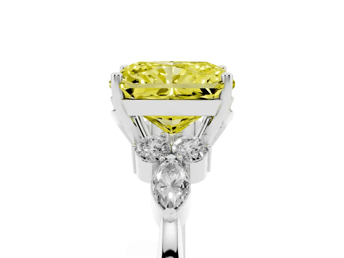 Fancy Yellow Radiant Cut Brilliant Diamond Solitaire Ring with Pear Side Stones and Four-Prong Setting Platinum