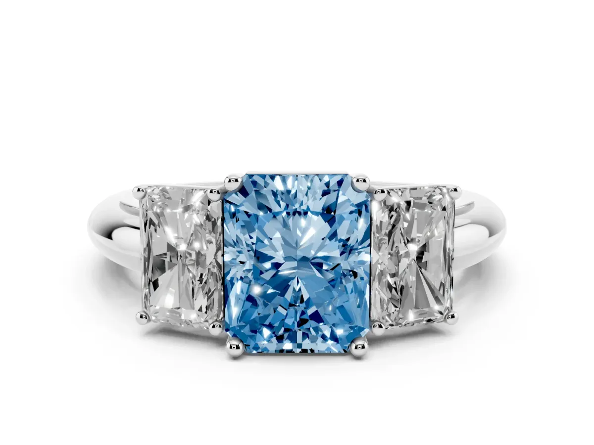 Fancy Blue Three-Stone Radiant Cut Cut Diamond Engagement Ring with Prong Setting on a White Gold Band Silver