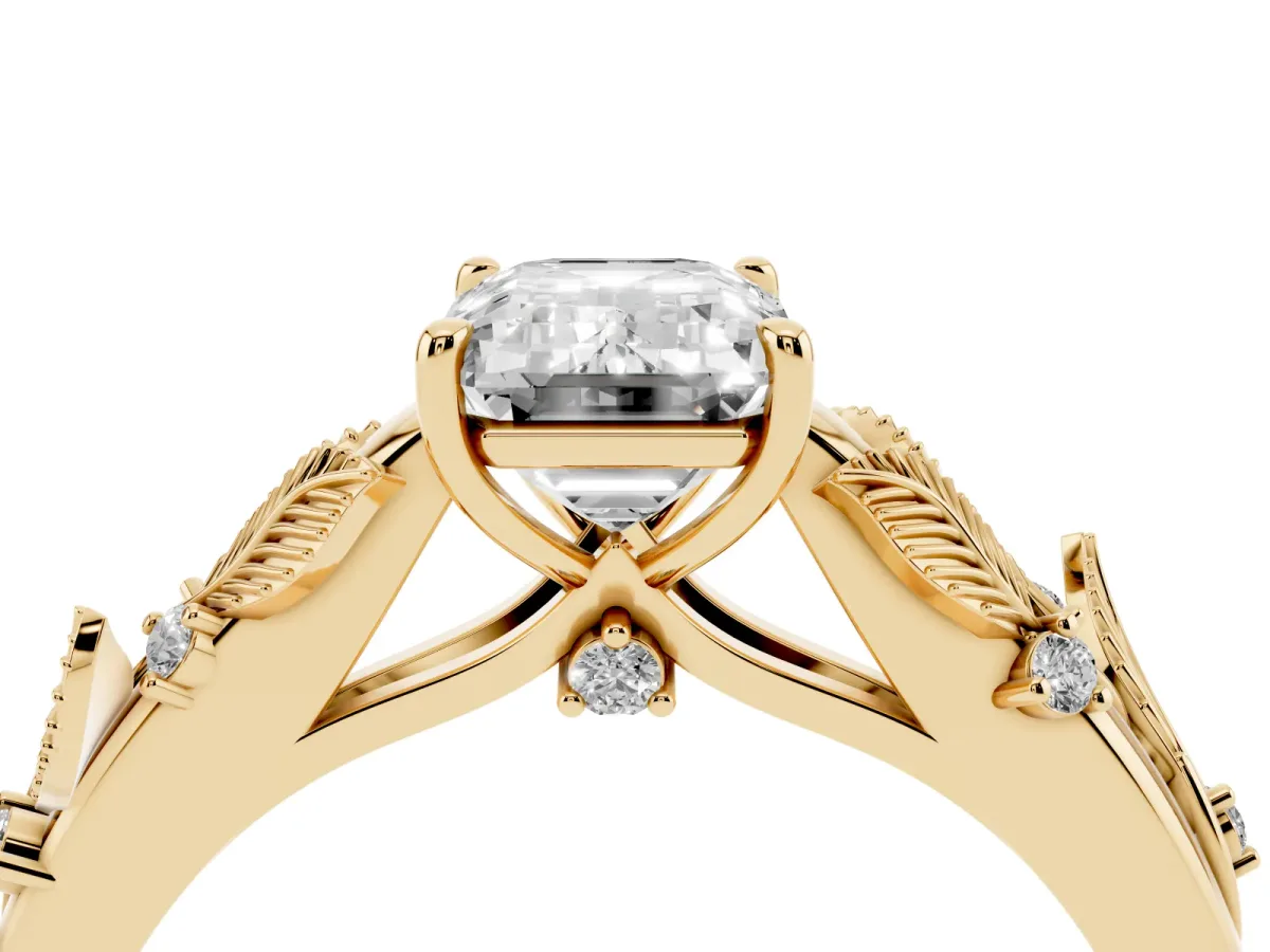Emerald Cut Diamond Solitaire Ring with Leaf Motif Band and Four-Prong Setting Yellow gold