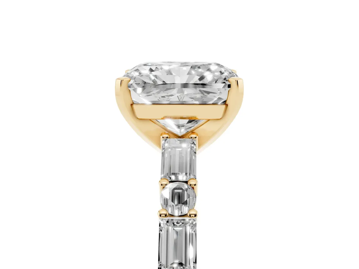 Radiant Cut Diamond Solitaire with Side Baguettes and Channel Set Band Yellow gold