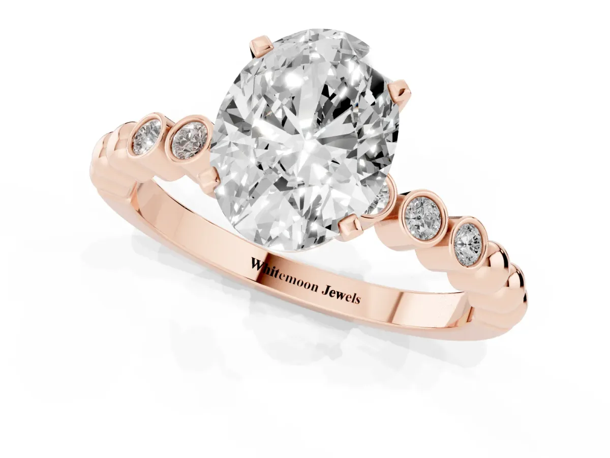 Oval Cut Solitaire Bezel Accent Diamond Engagement Ring with Beaded Band and Four-Prong Setting Rose gold