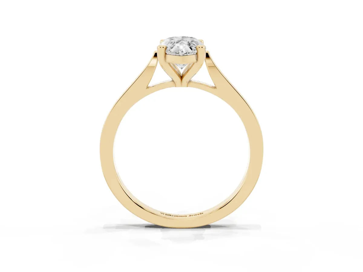 Marquise Cut Solitaire Diamond Ring with Four-Prong Setting and Tapered Band Yellow gold
