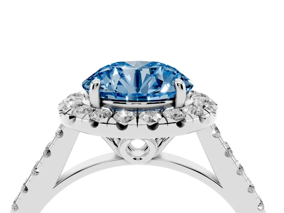 Fancy Blue Round Cut Halo Pavé Diamond Engagement Ring with Four-Prong Setting Silver
