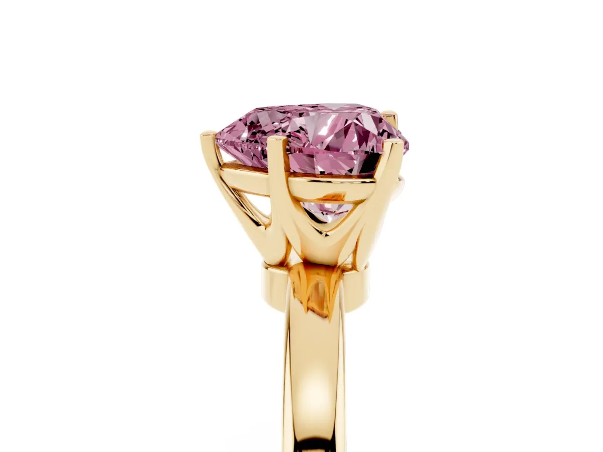 Fancy Pink Heart Cut Solitaire Diamond Ring with Six-Prong Setting on a Classic Band Yellow gold