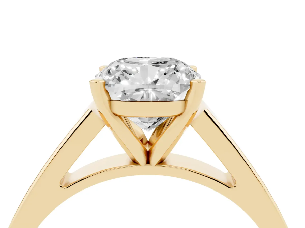 Cushion Cut Solitaire Engagement Ring with Four-Prong Setting and Tapered Band Yellow gold