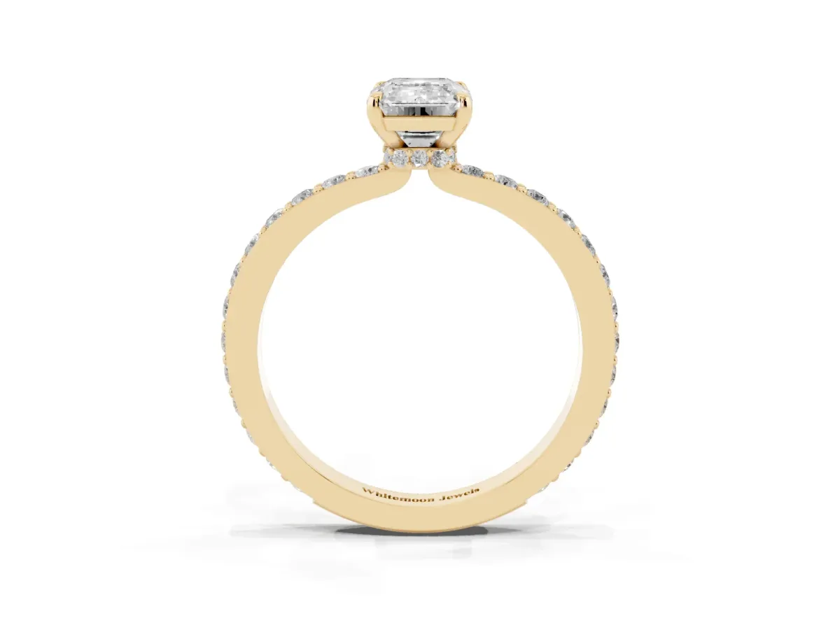 Emerald Cut Diamond Pavé Engagement Ring with Round Accents and Prong Setting Yellow gold