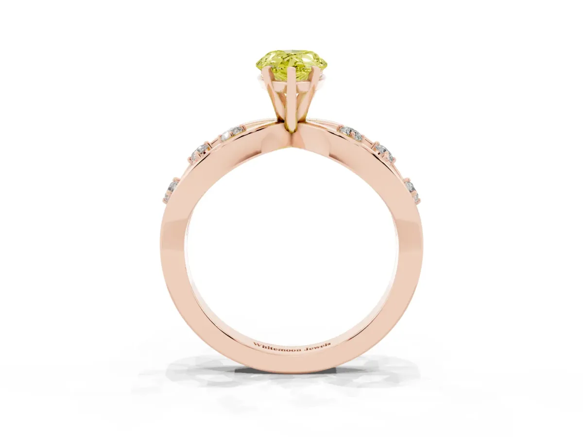 Fancy Yellow Pear Cut Cut Solitaire Diamond with Side Stones on Criss-Cross Band and Four-Prong Setting Rose gold