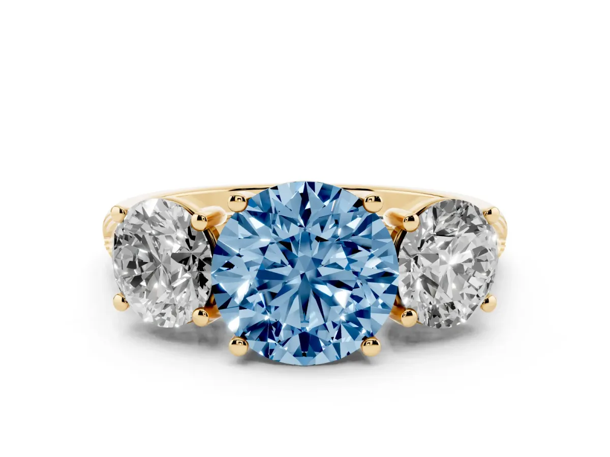 Fancy Blue Three-Stone Round Cut Diamond Ring with Round Pavé Band and Prong Setting Yellow gold