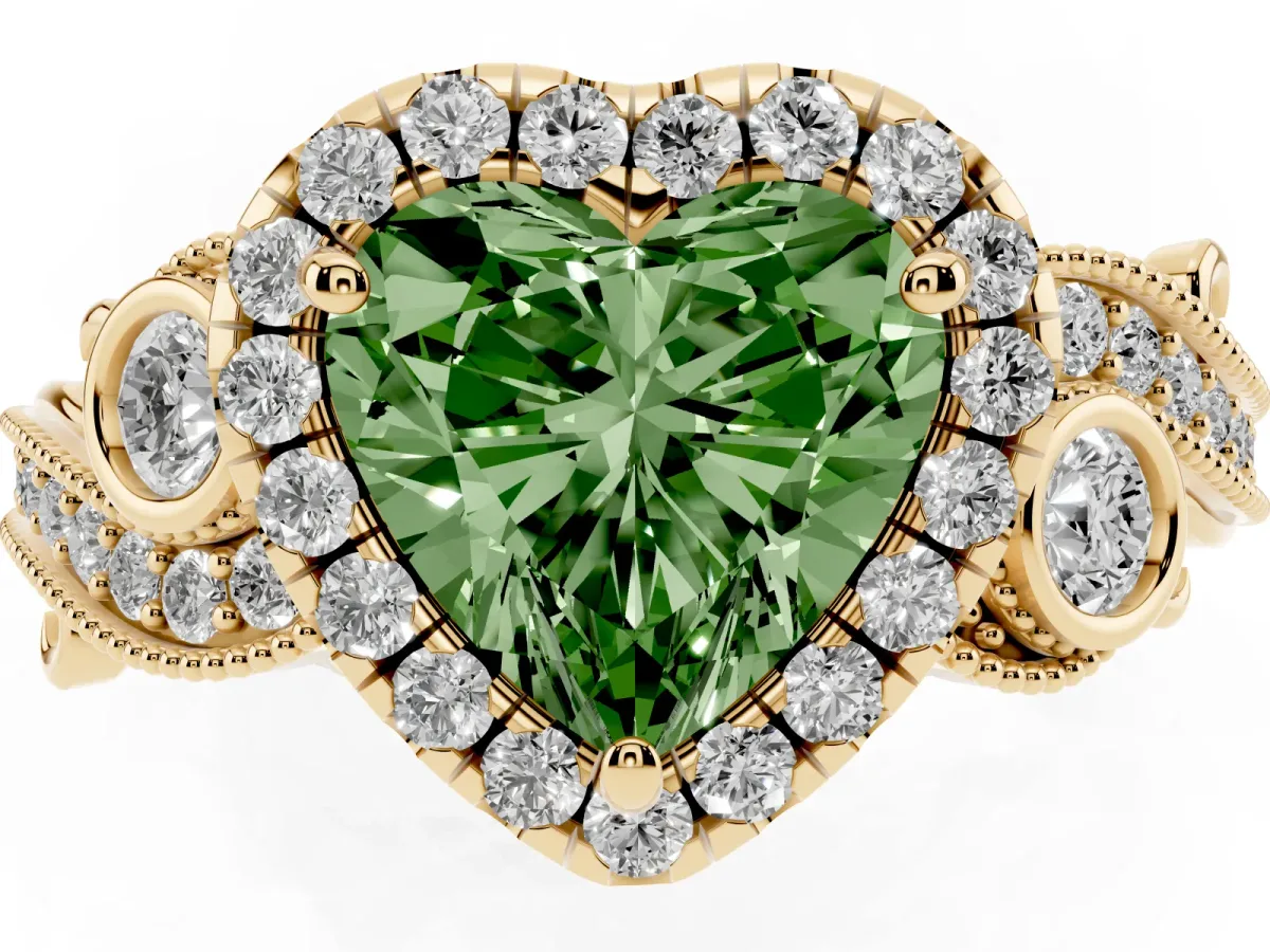 Fancy Green Heart Cut Halo Diamond Ring with Milgrain and Bezel Accents on a Split Shank Band Yellow gold