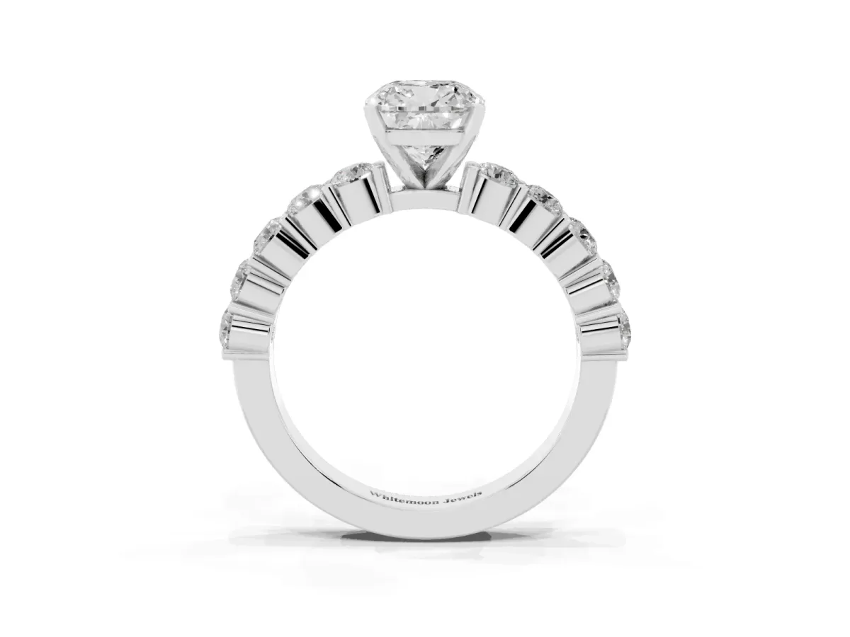 Cushion Cut Diamond Solitaire Ring with Shared Prong Round Side Stones Platinum