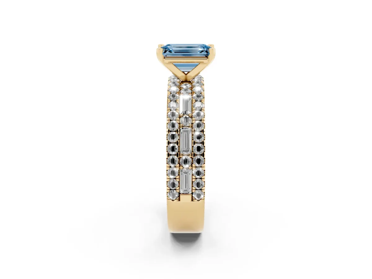 Fancy Blue Emerald Cut Diamond Solitaire Ring with Pavé and Channel Set Band Yellow gold