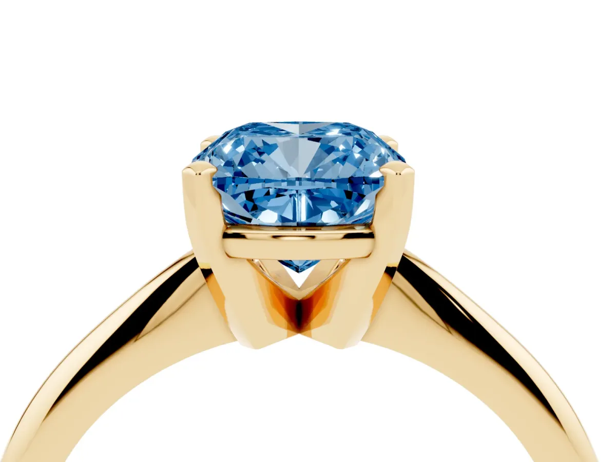 Fancy Blue Cushion Cut Cut Solitaire Ring with Four-Prong Setting on a Classic Band Yellow gold