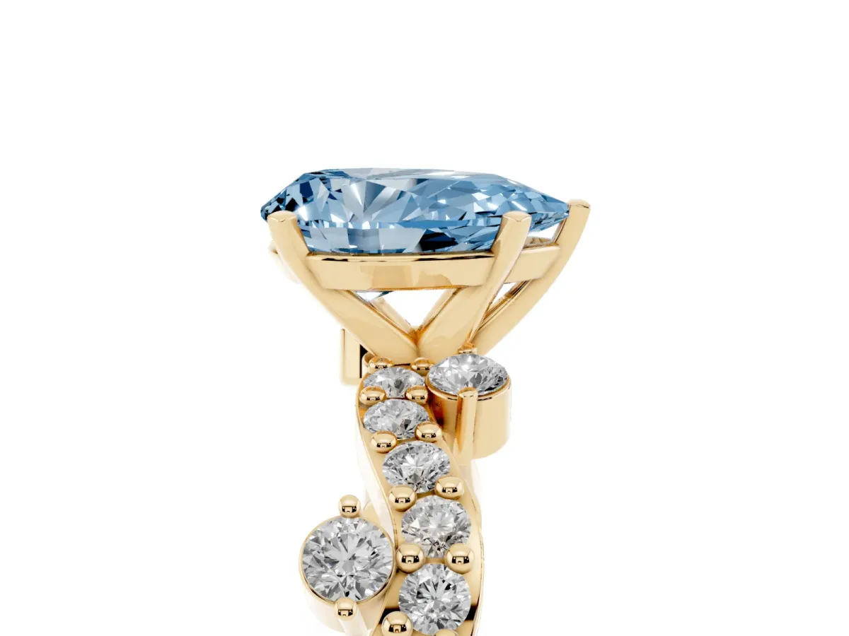 Fancy Blue Pear Cut Cut Solitaire Diamond Twisted Band with Pave Setting Yellow gold