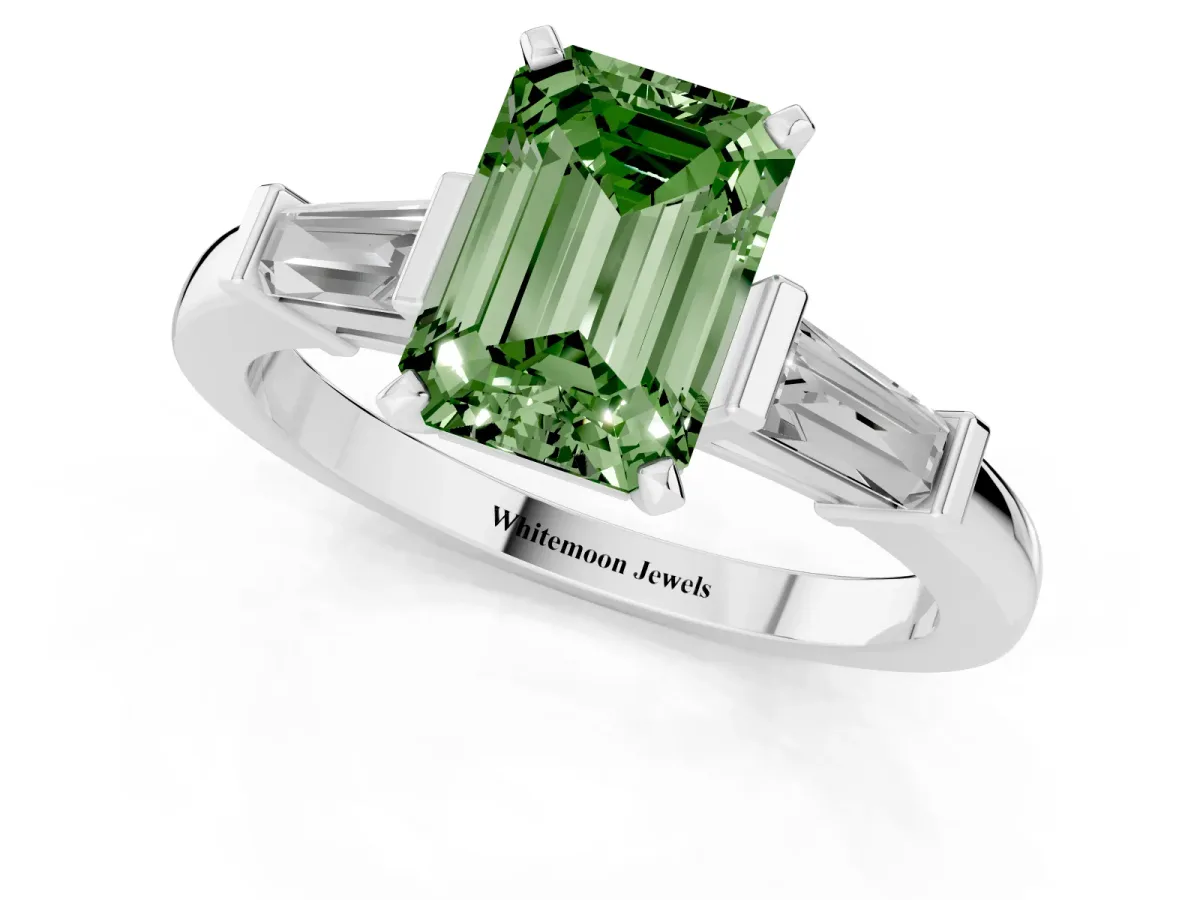 Fancy Green Emerald Cut Cut Diamond Solitaire Ring with Tapered Baguette Accents and Four-Prong Setting Silver