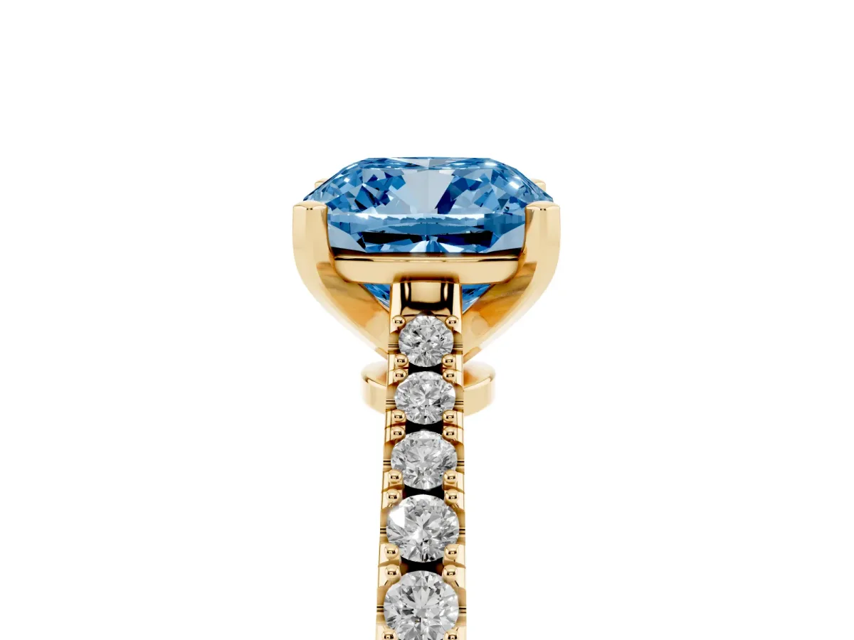 Fancy Blue Cushion Cut Cut Solitaire Diamond Engagement Ring with Pave Band and Four-Prong Setting Yellow gold