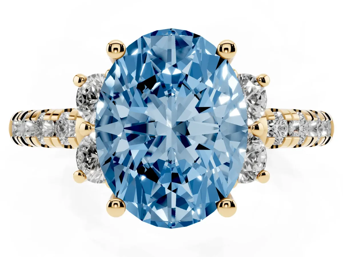 Fancy Blue Oval Cut Diamond Three-Stone Pave Band with Four-Prong Setting Yellow gold
