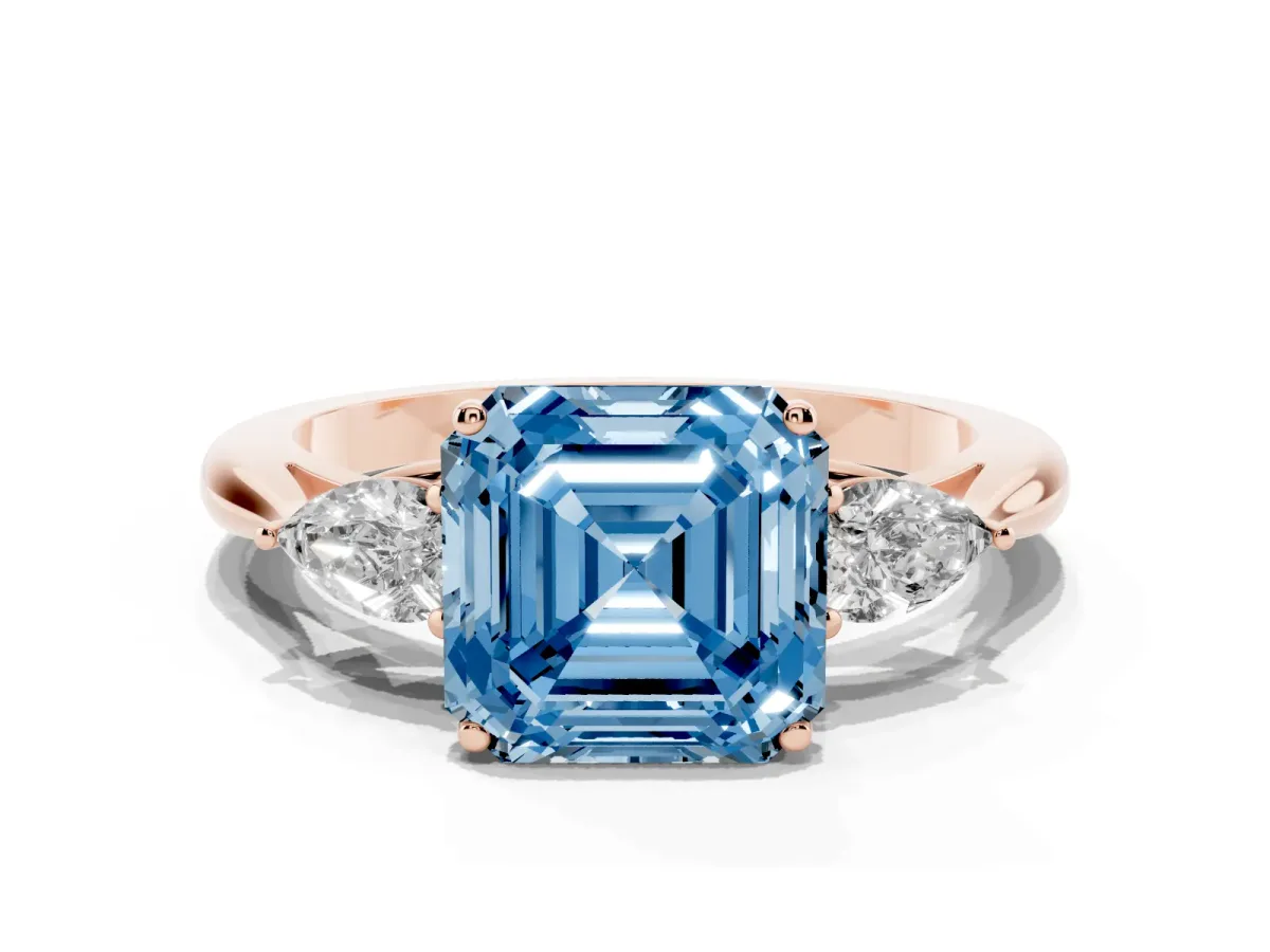Fancy Blue Asscher Cut Diamond Three-Stone Ring with Pear Side Stones and Prong Setting Rose gold