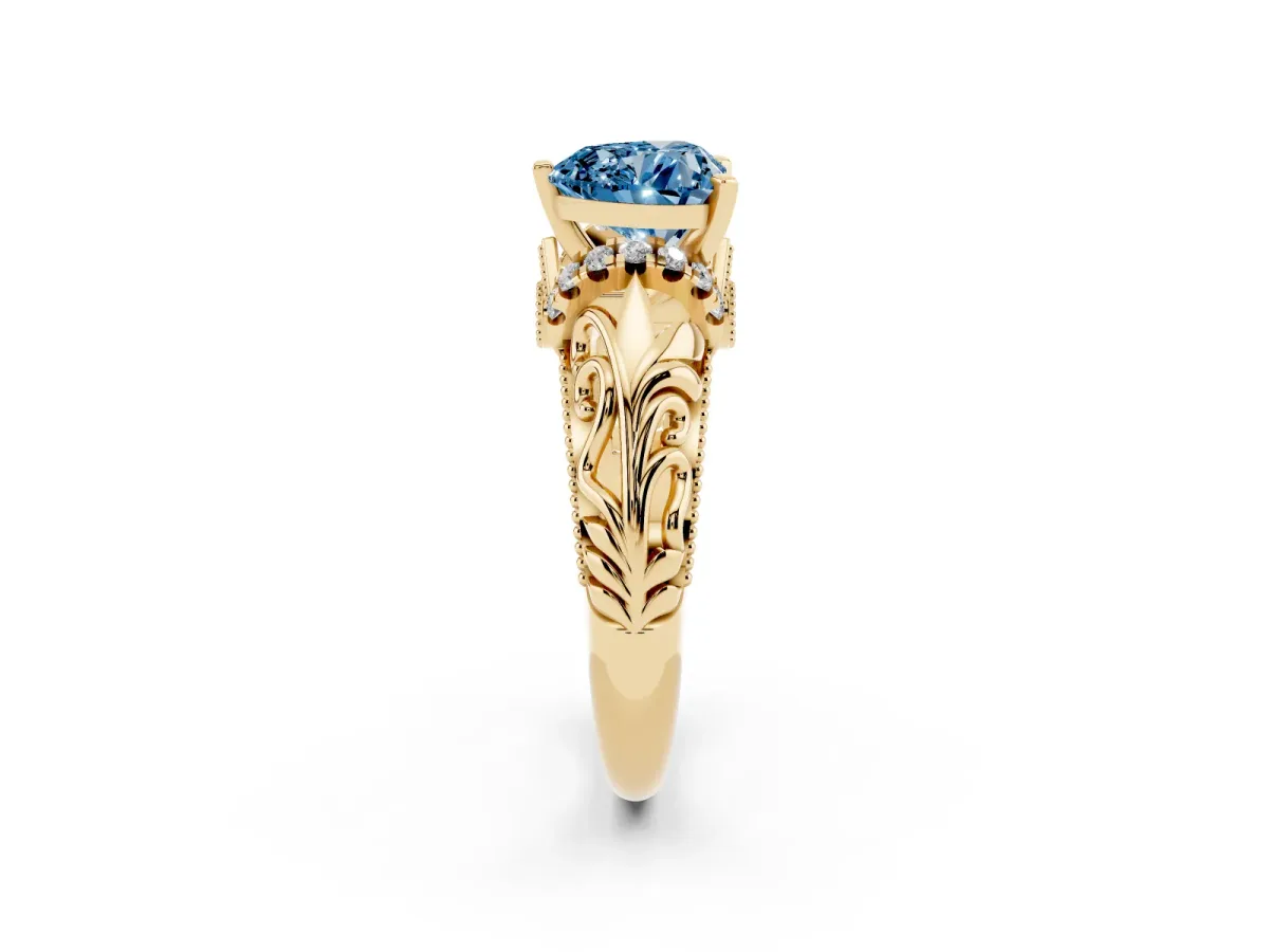 Fancy Blue Heart Cut Solitaire Filigree Engagement Ring with Halo and Prong Setting Yellow gold