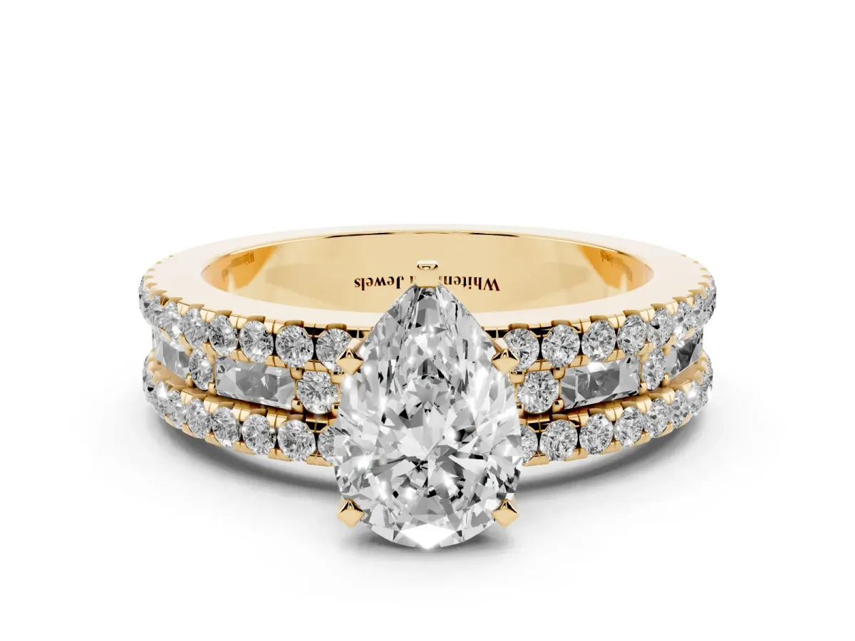 Pear Cut Diamond Solitaire Ring with Pavé and Channel Set Band Yellow gold