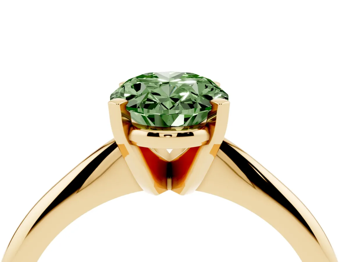 Fancy Green Oval Cut Cut Solitaire Ring with Four-Prong Setting on a Classic Band Yellow gold