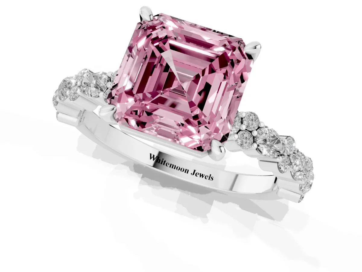 Fancy Pink Asscher Cut Diamond Side Stone Solitaire Ring with Round and Four-Prong Setting Platinum