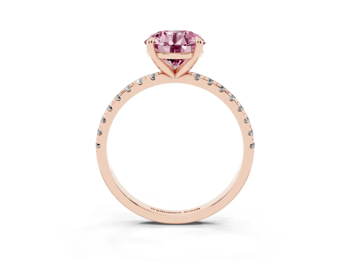Fancy Pink Round Cut Diamond Brilliant Solitaire Ring with Pavé Band and Four-Prong Setting Rose gold