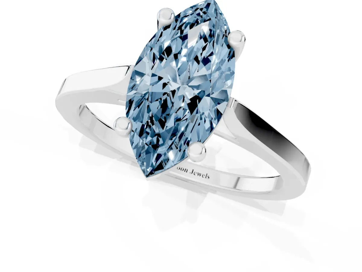 Fancy Blue Marquise Cut Solitaire Diamond Ring with Four-Prong Setting and Tapered Band Platinum
