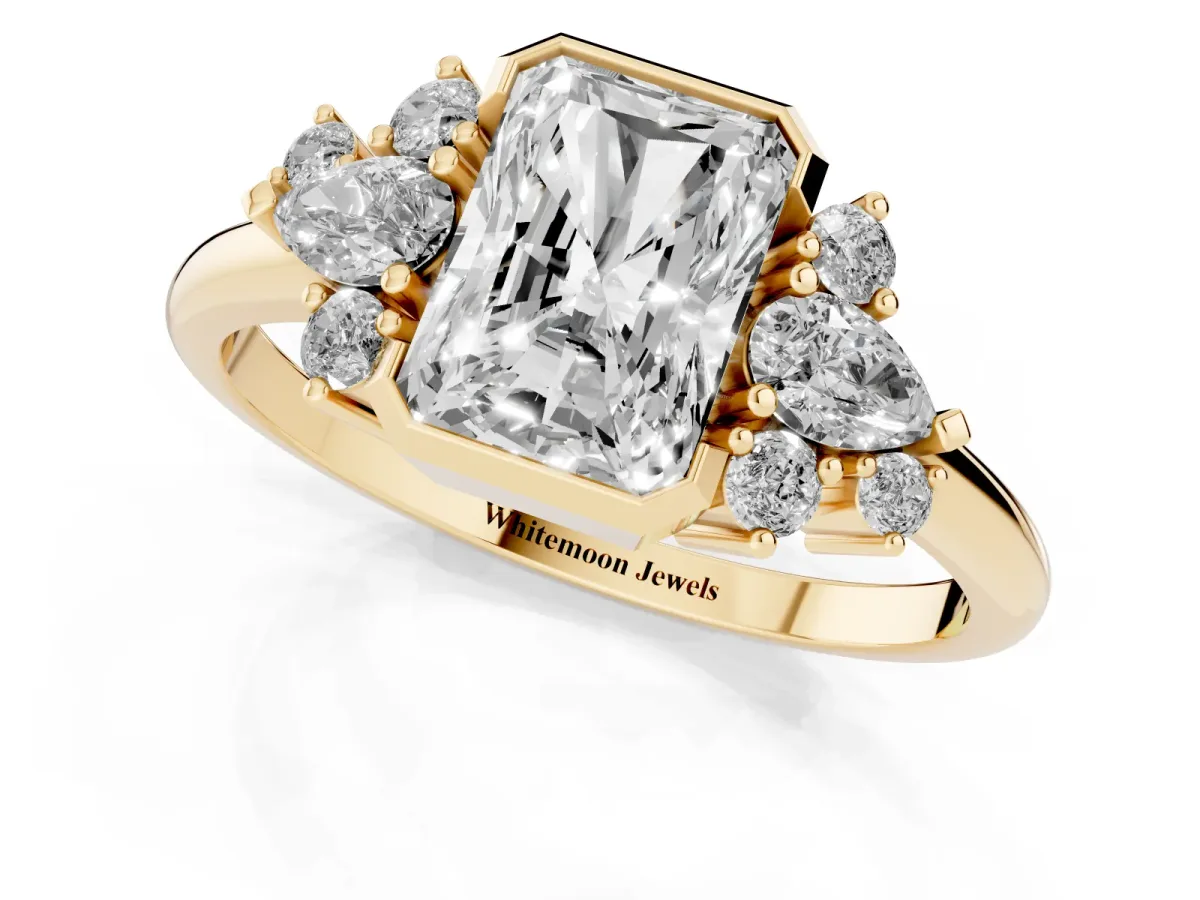 Radiant Diamond Engagement Ring with Pear and Round Side Stones Yellow gold