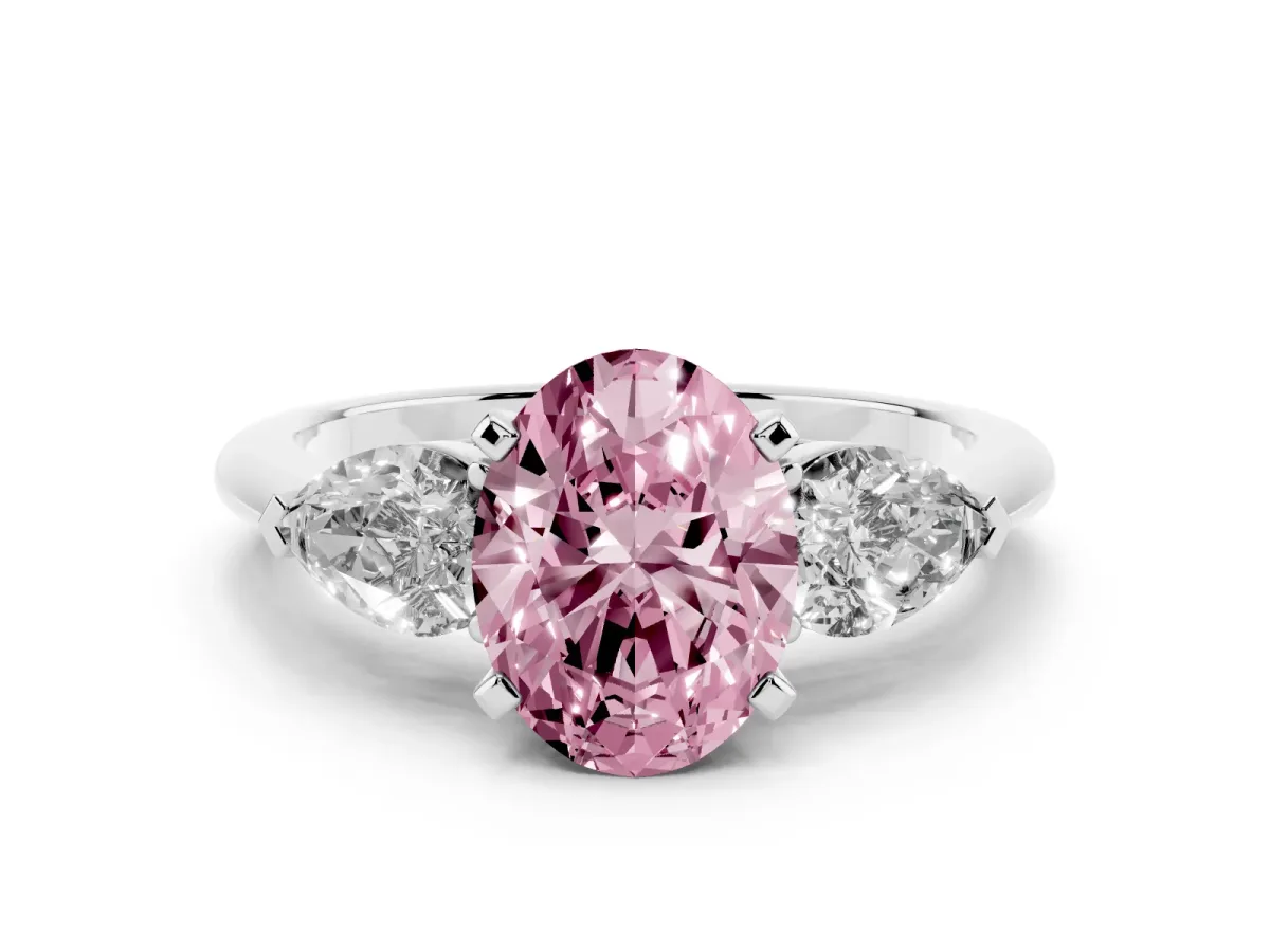 Fancy Pink Three-Stone Oval Cut Diamond Ring with Pear Side Stones and Four-Prong Setting Silver