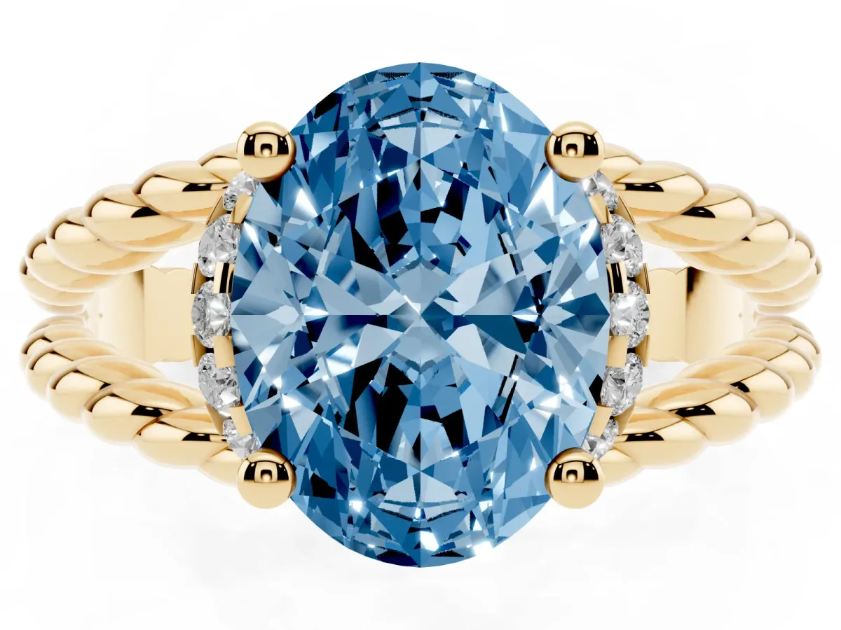 Fancy Blue Oval Cut Halo Twisted Band Four-Prong Ring Yellow gold