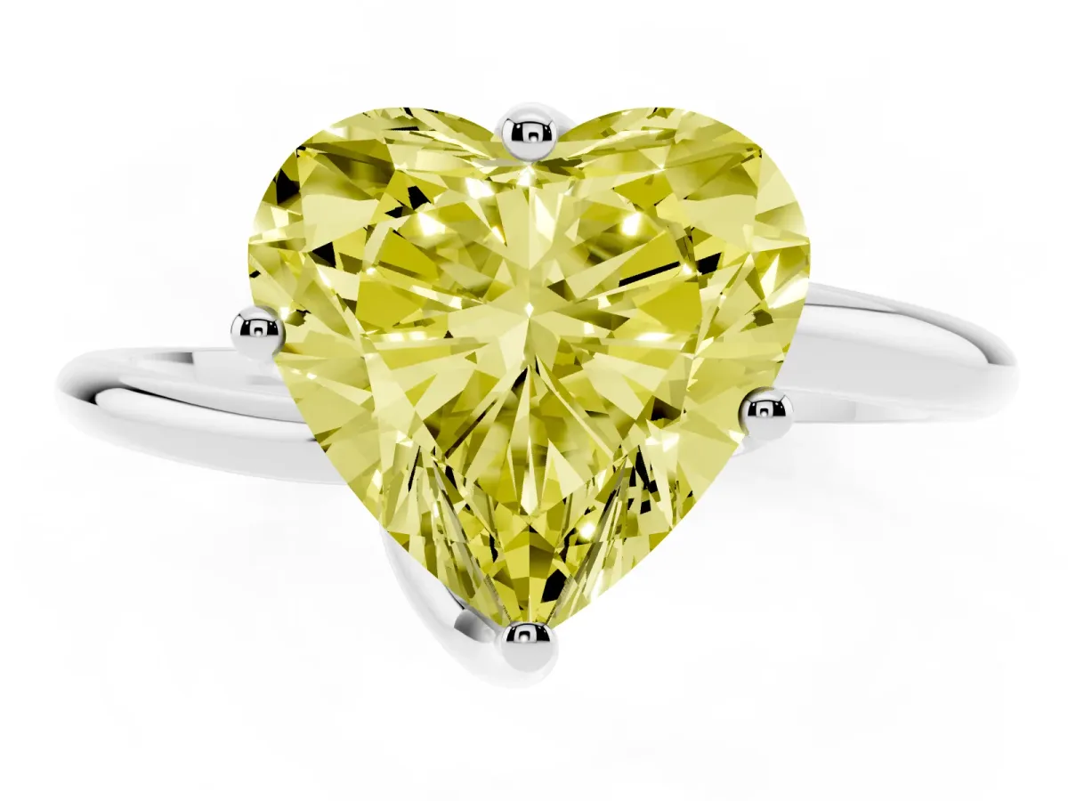 Fancy Yellow Heart Cut Diamond Solitaire Engagement Ring with Four-Prong Setting and Classic Band Silver