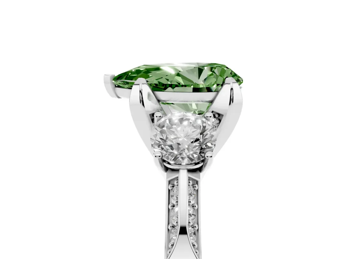 Fancy Green Pear Cut Brilliant Three-Stone Diamond Ring with Pavé Band and Four-Prong Setting Silver