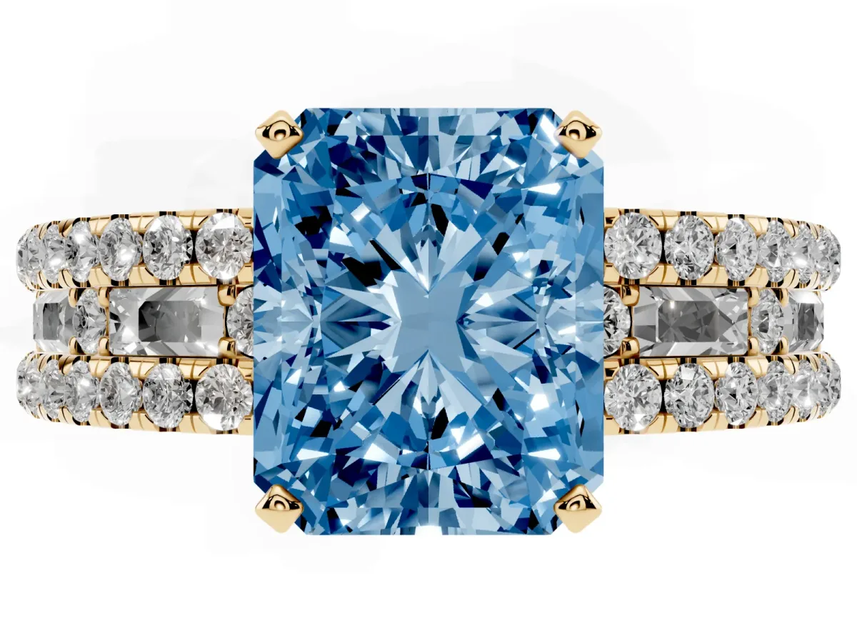 Fancy Blue Radiant Cut Diamond Solitaire Ring with Pavé and Channel Set Band Yellow gold