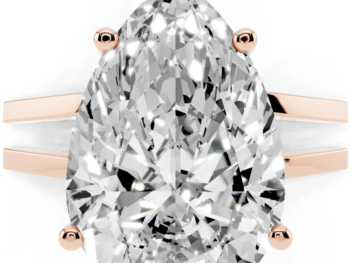Pear Cut Cut Diamond Solitaire Engagement Ring with Tapered Plain Band and Four-Prong Setting Rose gold