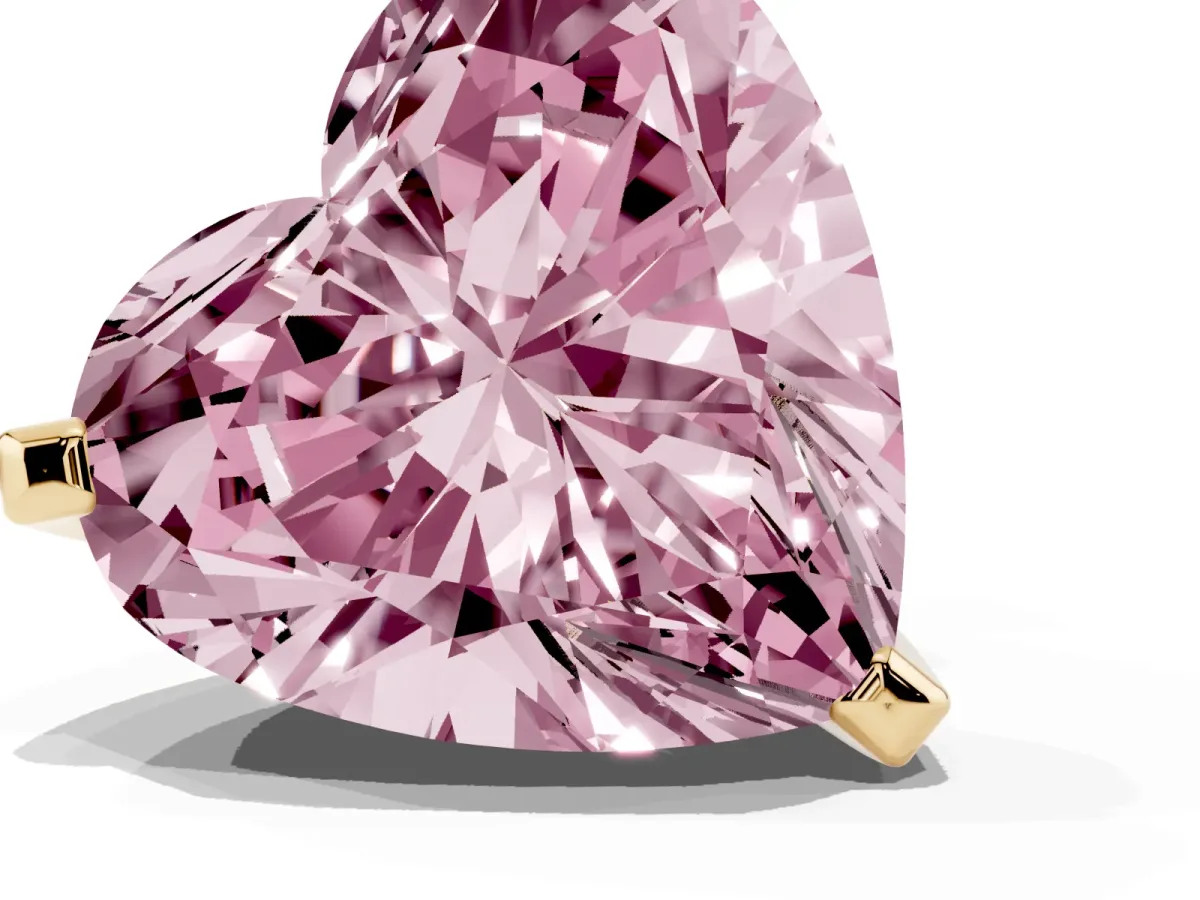 Fancy Pink Heart Cut Diamond Solitaire Ring with Prong Setting and Classic Band Yellow gold