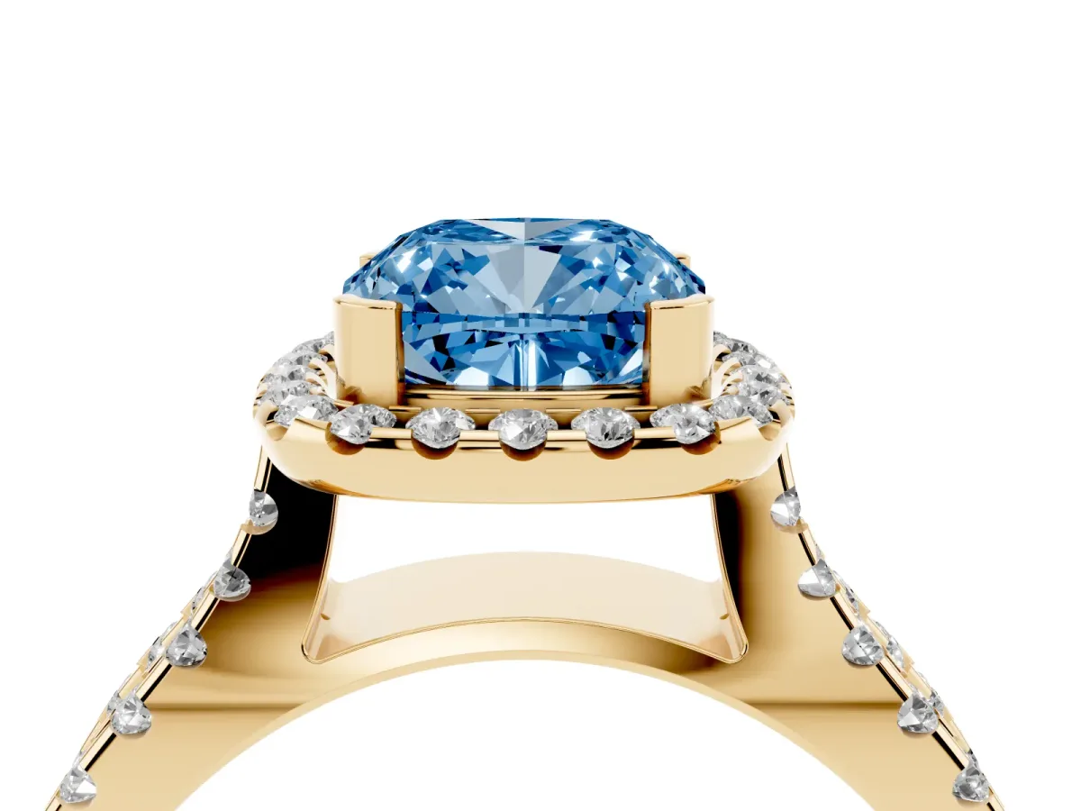 Fancy Blue Cushion Cut Diamond Halo Ring with Split Shank Pavé Band and Prong Setting Yellow gold