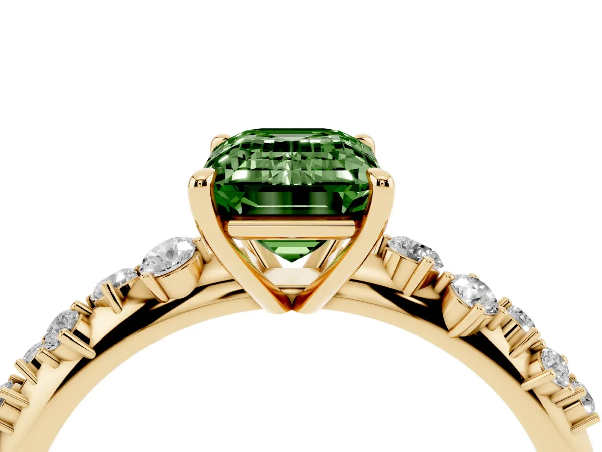 Fancy Green Emerald Cut Diamond Cluster Side Stone Solitaire Ring with Prong Setting Yellow gold